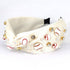 THEME BEADED HEADBAND