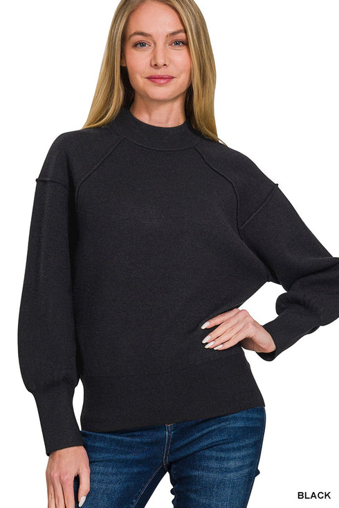 EXPOSED SEAM MOCK SWEATER