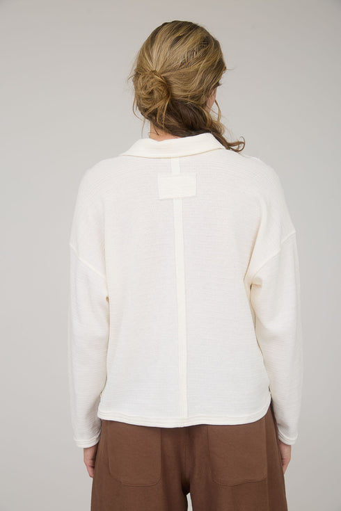 EXPOSSED KNIT POLO TOP